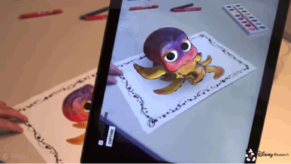 ,通过增强现实技术，研究员可以将你的彩色书变成3D模型