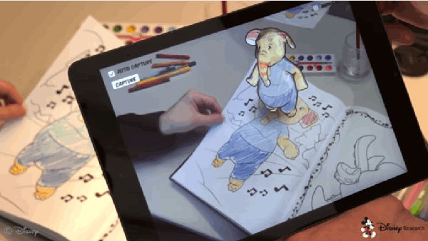 ,通过增强现实技术，研究员可以将你的彩色书变成3D模型