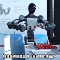 第一批会穿糖葫芦的机器人现身北京 机器人会串糖葫芦